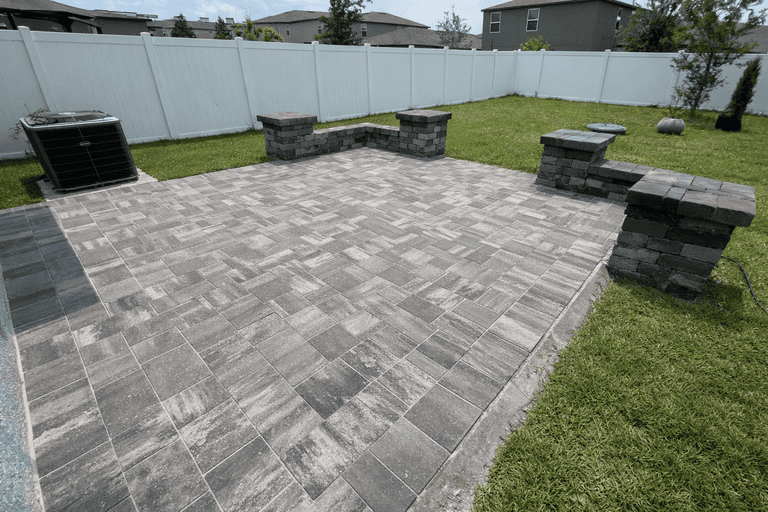 Patio paver installation in Tampa Bay at a residential property