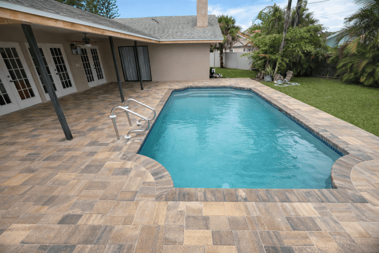 Pool deck paver installation in Tampa Bay at a residential property