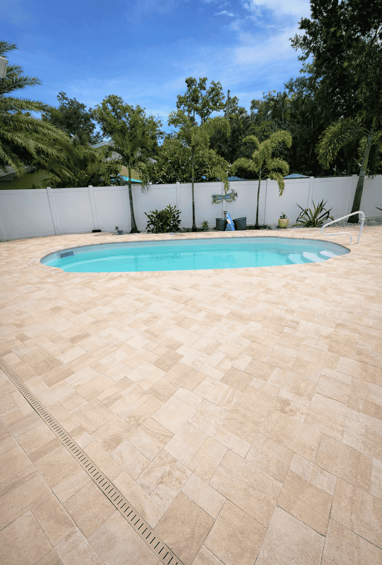 Pool deck paver installation in Tampa Bay at a residential property