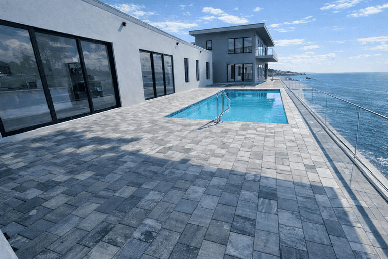 Pool deck paver installation in Tampa Bay at a residential property
