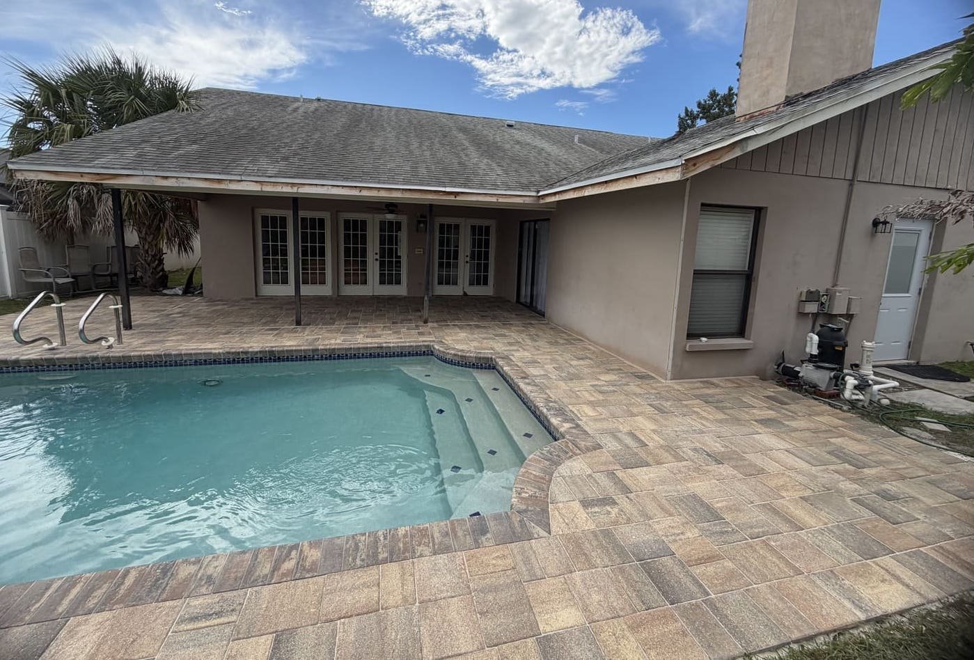 Pool deck paver installation in Tampa Bay at a residential property