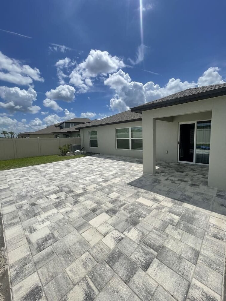 Another finished view of a completed backyard paver patio installation in Tampa Bay