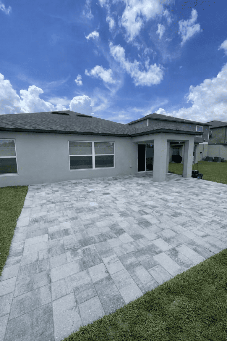 Patio paver installation in Tampa Bay at a residential property