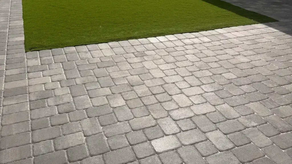 artificial turf vs natural grass shown in a real Tampa Bay outdoor project