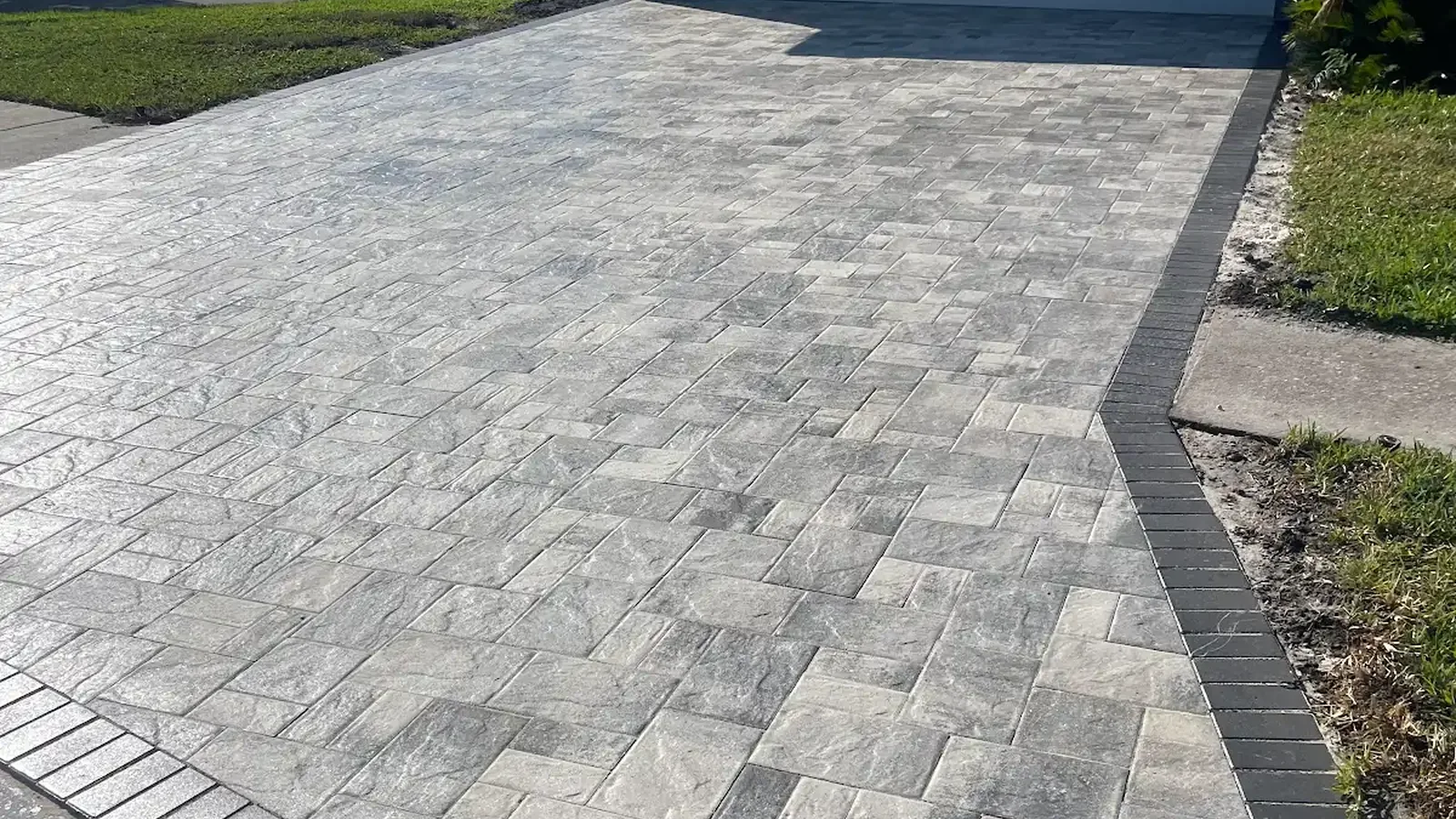 sealed vs unsealed pavers shown in a real Tampa Bay outdoor project