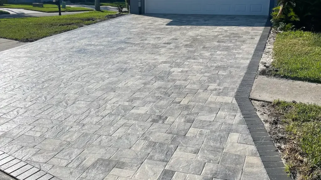 why are my pavers turning white shown in a real Tampa Bay outdoor project