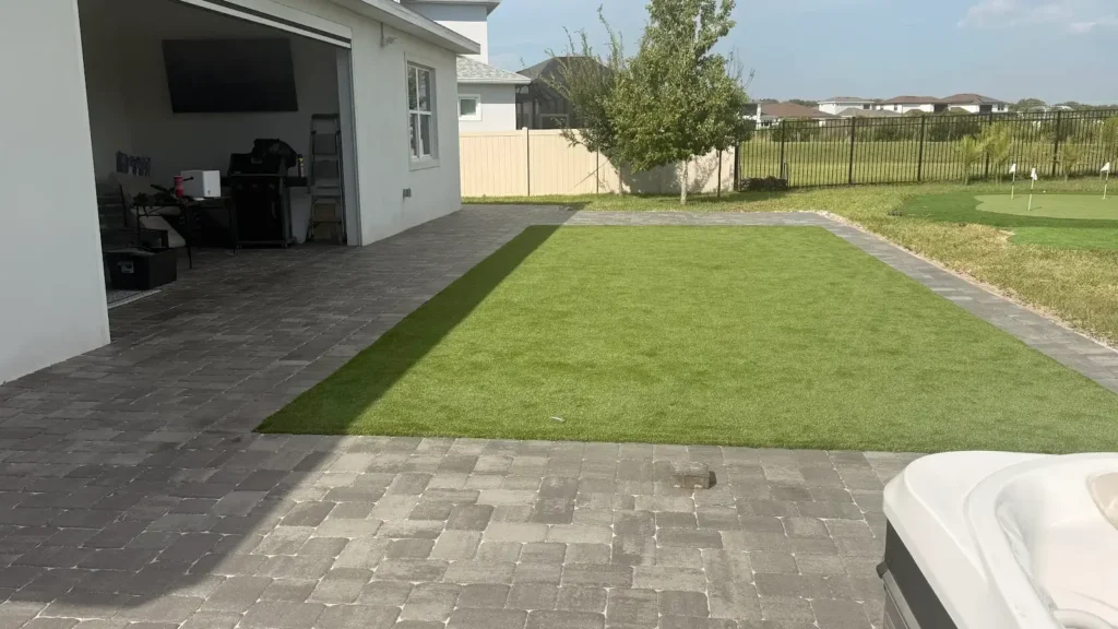 artificial turf cost Tampa shown in a real Tampa Bay outdoor project