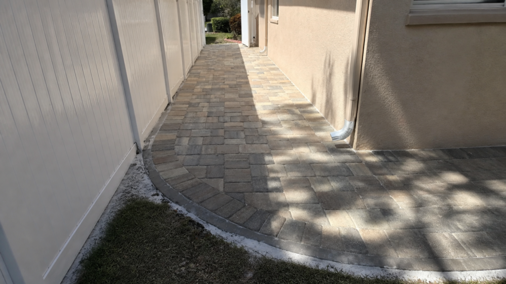 paver walkway edge restraint at a completed Dr Pavers Design project